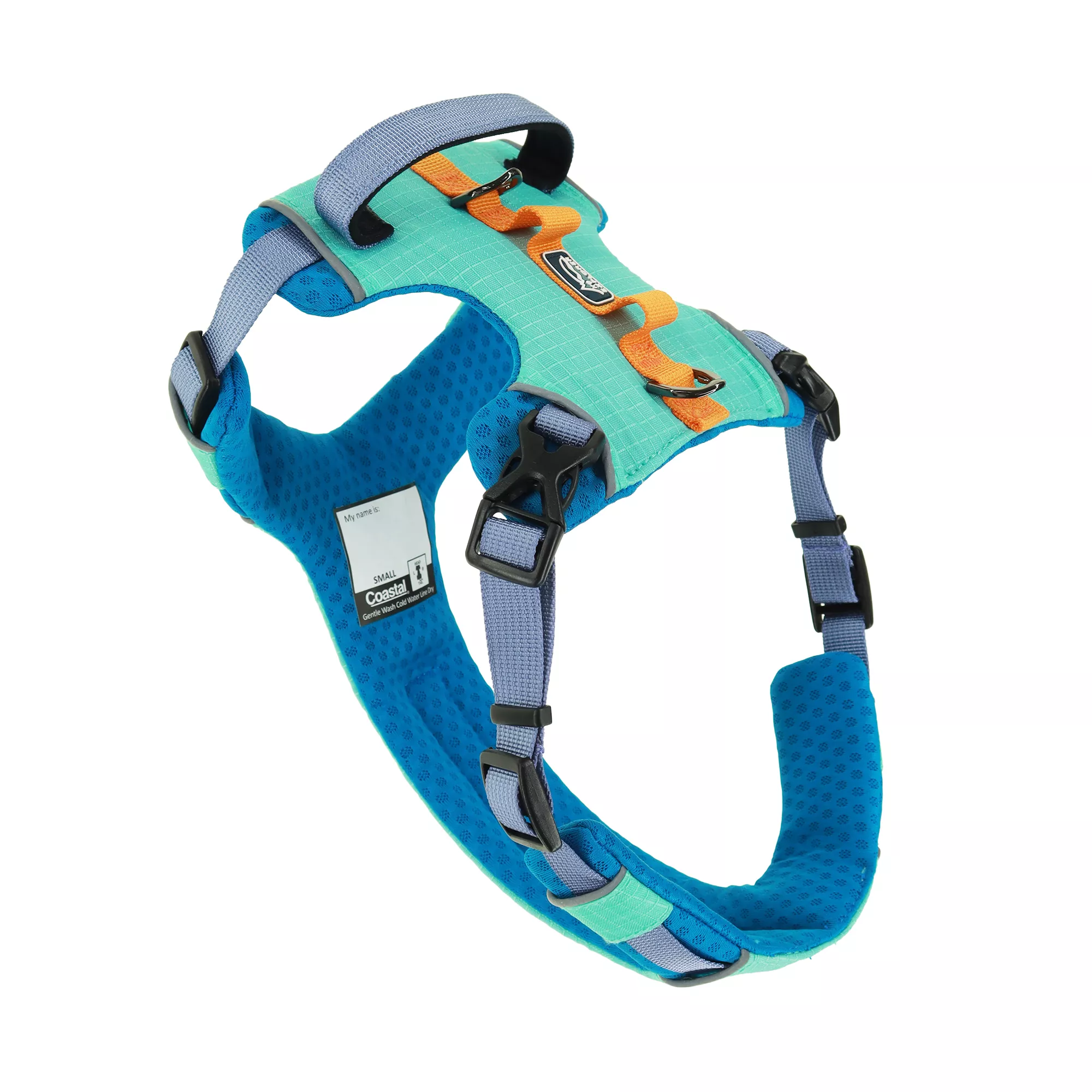 A full‑coverage harness in teal is displayed angled against a white background. The harness features a contoured design with teal fabric, gray side straps, and black plastic buckles. The stitching forms a grid pattern across the main panel. A small rectangular brand label is sewn onto the chest panel.